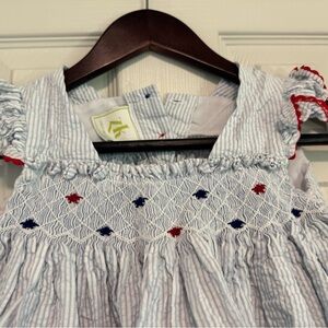 Light Blue Seersucker Smocked Sundress with Red & Navy Embroidery